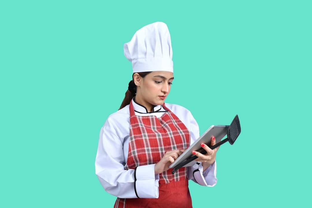 a person holding a laptop
